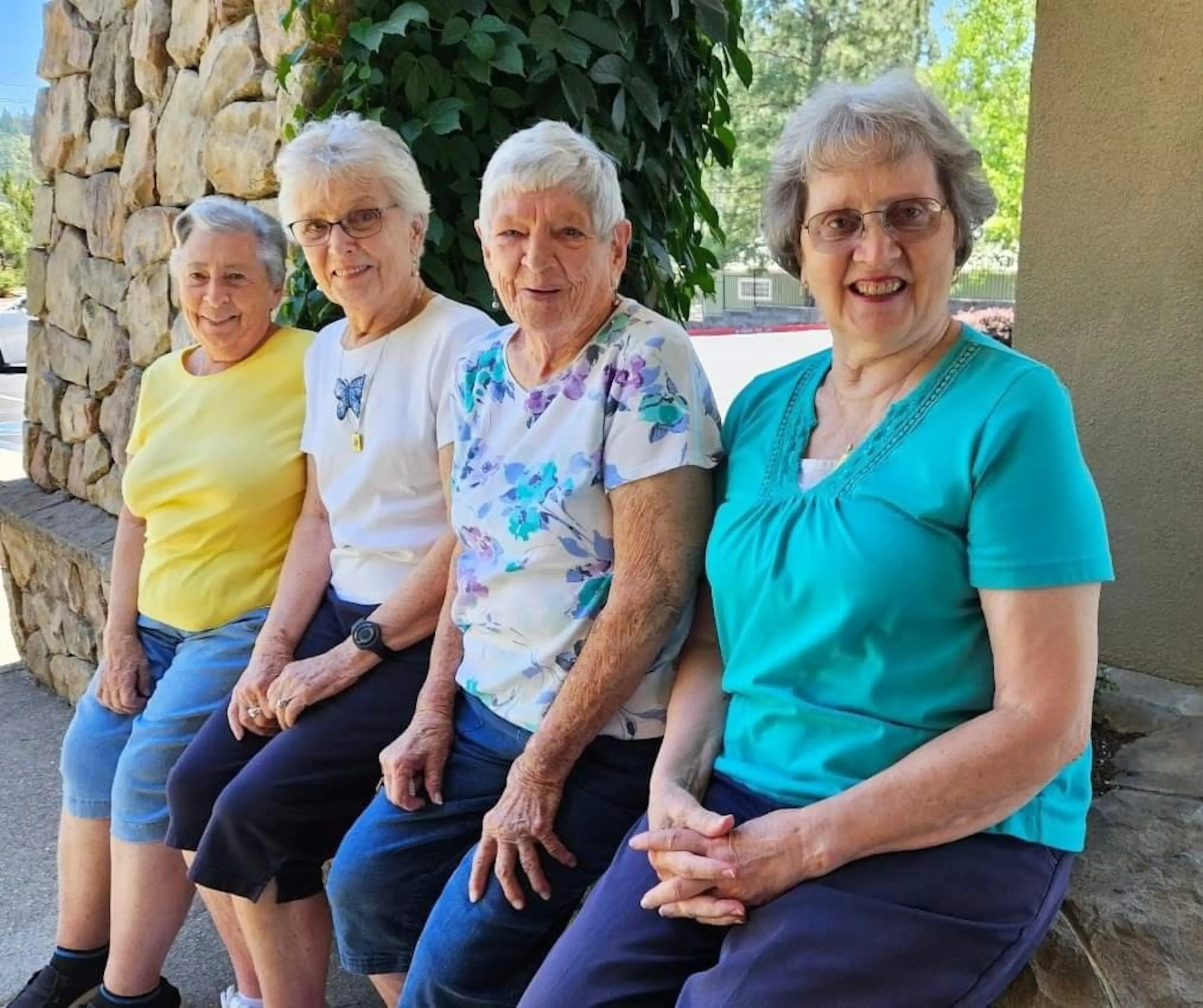PHOTO: Mary Grace Tassone, Joan Harris, Elsie Webb and Sylvia Crane, pictured left to right, all attended the same high school.