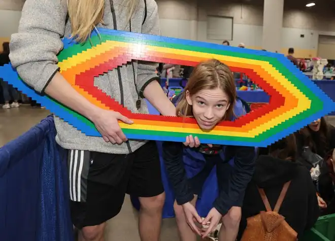 Eli Benson, 13, of Coralville created art at Brick Fest Live featuring life-sized models made from Legos, hands-on activities, and a meet-and-greet with Manny from the 