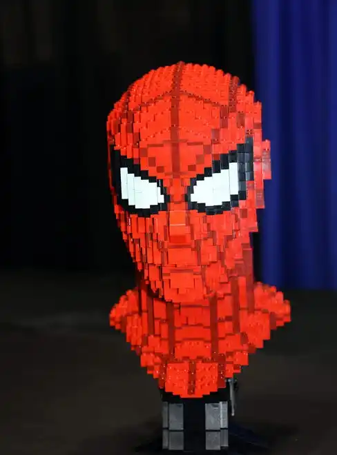 Spider-Man appears at Brick Fest Live featuring life-sized models made from Legos, hands-on activities, and a meet-and-greet with Manny from the 