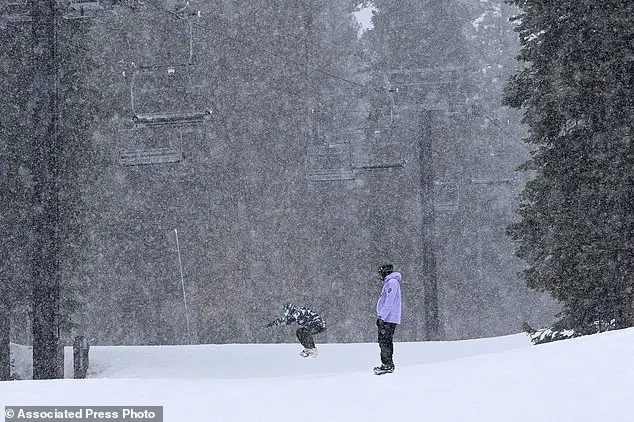Skiers enjoy a day of skiing and snow fall at North Star California Resort in Truckee, California on Thursday