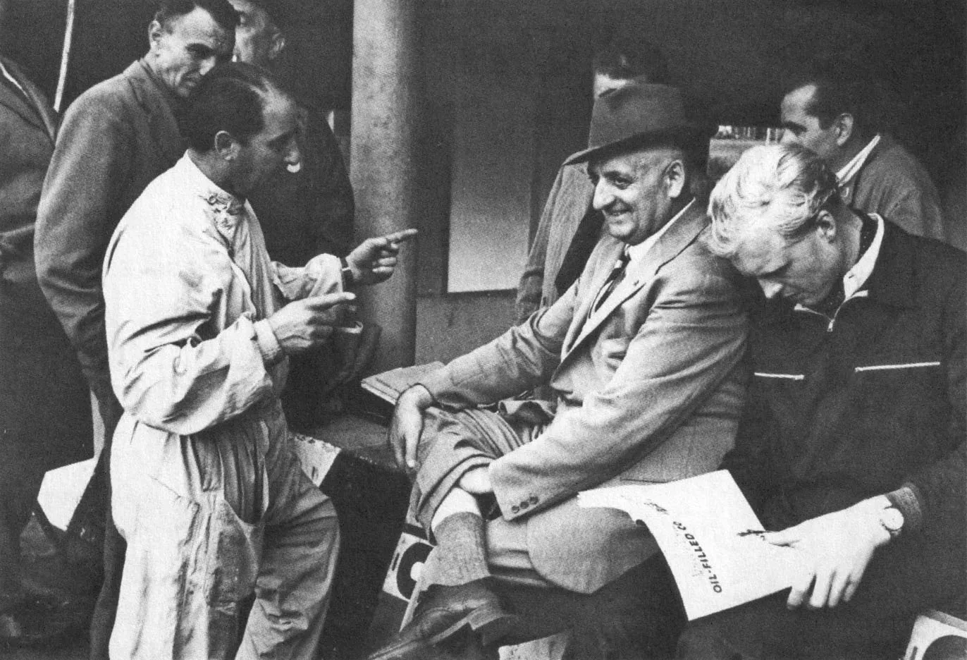 At Monza in 1953, at right next to Enzo Ferrari wearing a hat, Hawthorn was a favourite of Il Commendatore.