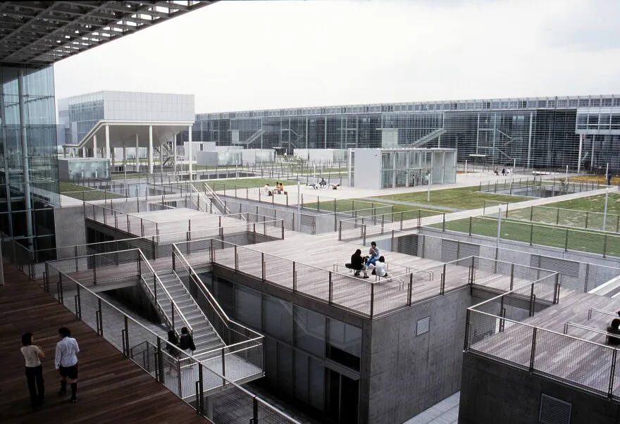 Saitama Prefectural University in Koshigaya, Japan specializes in nursing and health sciences. Nine buildings are connected by terraces and walkways.