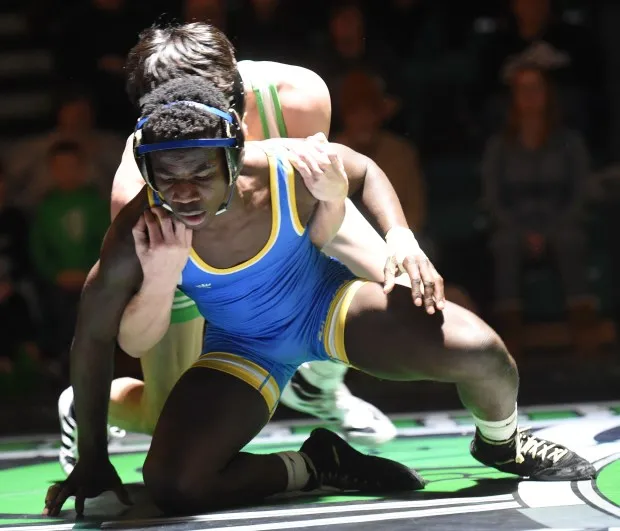 Pen Argyl's Aiden Knorr wrestles Wilson's David M'Balla in the 133 weight bout Monday, Jan. 8, 2024, at Pen Argyl Area High School. Amy Shortell/The Morning Call)