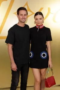 PARIS, FRANCE - JUNE 20: (EDITORIAL USE ONLY - For Non-Editorial use please seek approval from Fashion House) Evan Spiegel and Miranda Kerr attend the Louis Vuitton Menswear Spring/Summer 2024 show as part of Paris Fashion Week  on June 20, 2023 in Paris, France. (Photo by Antoine Flament/Getty Images)