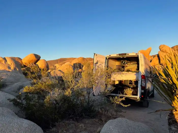 The author’s van parked in Joshua Tree National Park.