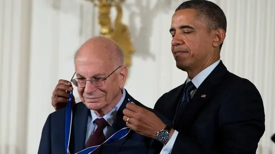 FILE - President Barack Obama awards psychologist Daniel Kahneman with the Presidential Medal of Freedom, Nov. 20, 2013, during a ceremony in the East Room of the White House in Washington. Kahneman, a psychologist who won a Nobel Prize in economics for his insights into how ingrained neurological biases influence decision-making, died Wednesday, March 27, 2024, at the age of 90. (AP Photo/Evan Vucci, File)(AP)