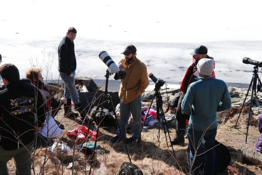 A handful of eclipse watchers set up early on Monday, April 8 at Lake Francis in Pittsburg.