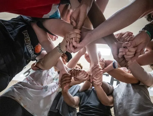 Students play the Human Knot game as they compete during the audition to be UCF’s mascot Knightro at The Venue Orlando, Fla., Saturday, April 6, 2024. (Willie J. Allen Jr./Orlando Sentinel)