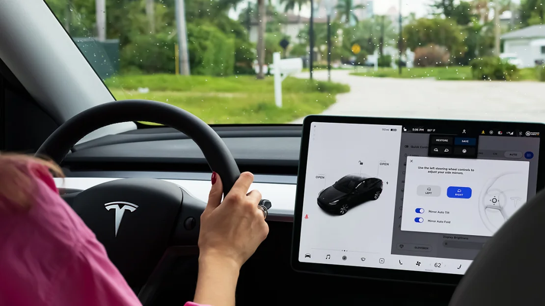 A cockpit with LCD touch screen of electric car Tesla Model Y during drive in Miami