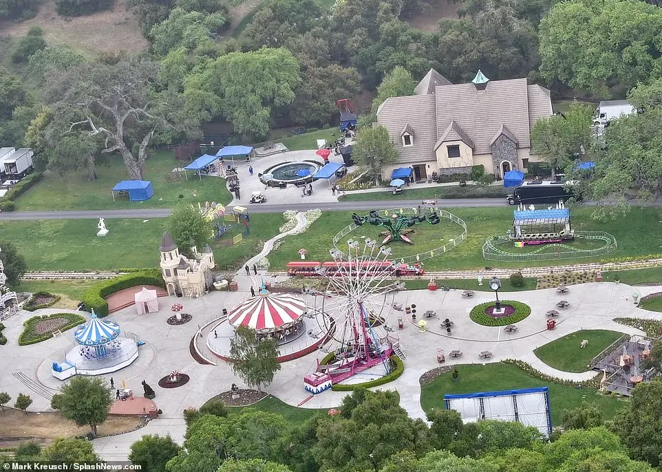 Ariel photos reveal the fairground rides, tents and children's trains Neverland became known for have all been carefully rebuilt, along with a Ferris wheel and a replica of Jackson's carousel