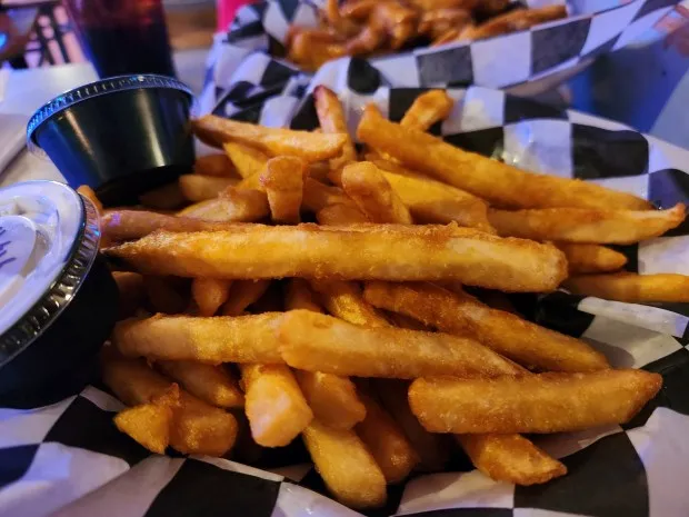 An order of the $2.99 Bone Stock Fries wasn't exactly overwhelmingly large during a recent to The Shop Bar and Grill in Painesville Township. (Mark Koestner - For The News-Herald)