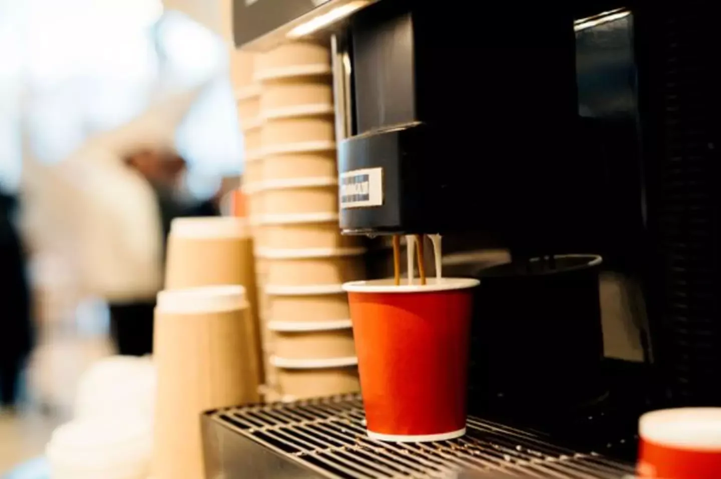 The woman purchased the coffee from a vending machine. (Fiordaliso/Getty Stock Image)