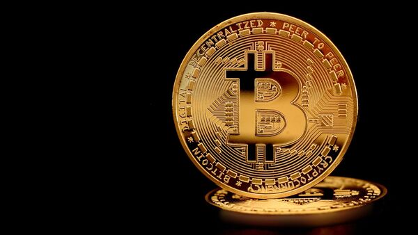 Bitcoin surpasses $69,000 mark, beating record of $68,991 in Nov 2021