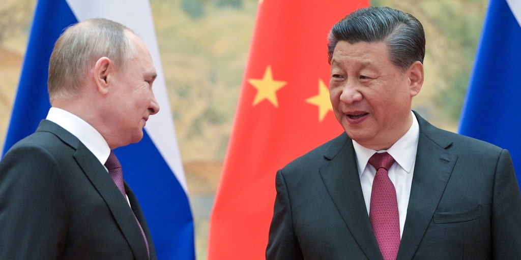 Russia, China team up against the US dollar with planned blockchain payment system