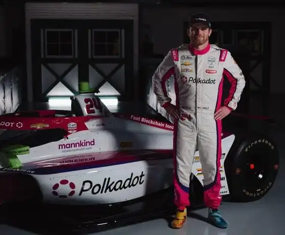 Conor Daly with Polkadot-sponsored car