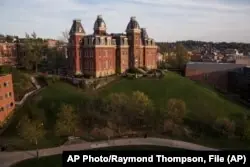 FILE - Woodburn Hall on West Virginia University’s downtown campus is shown April 24, 2015, in Morgantown, W. Virginia. (AP Photo/Raymond Thompson, File)