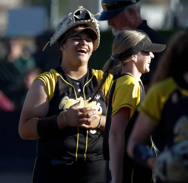 LIVERMORE - Granada player Delaney Aumua celebrates with teammates. Livermore and Granada played in a high school softball game at Livermore high school’s field in Livermore, Calif. on Friday, April 14, 2023 (Joseph Dycus/Bay Area News Group)