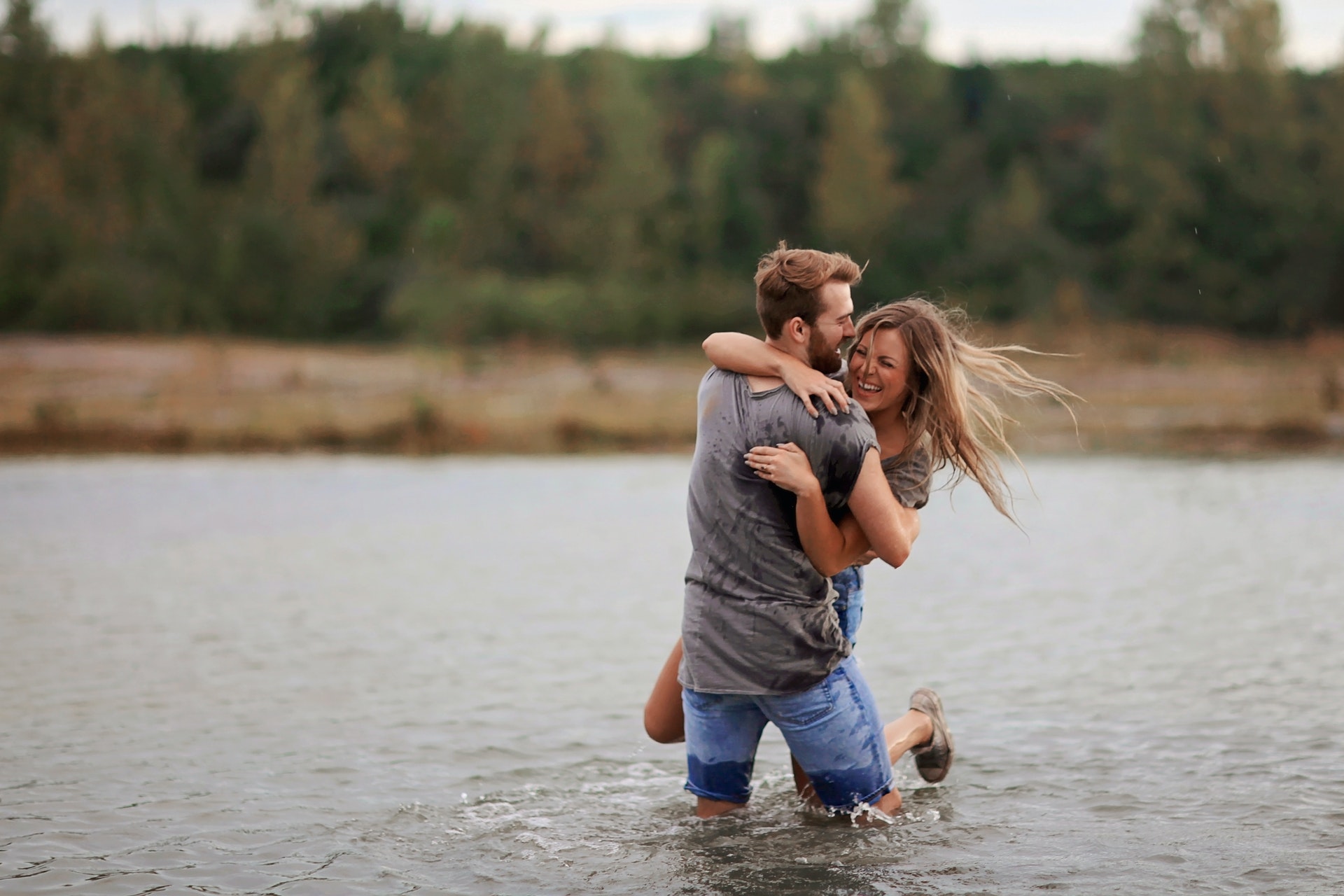 couple enjoying on the water