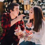 couple feeding dessert