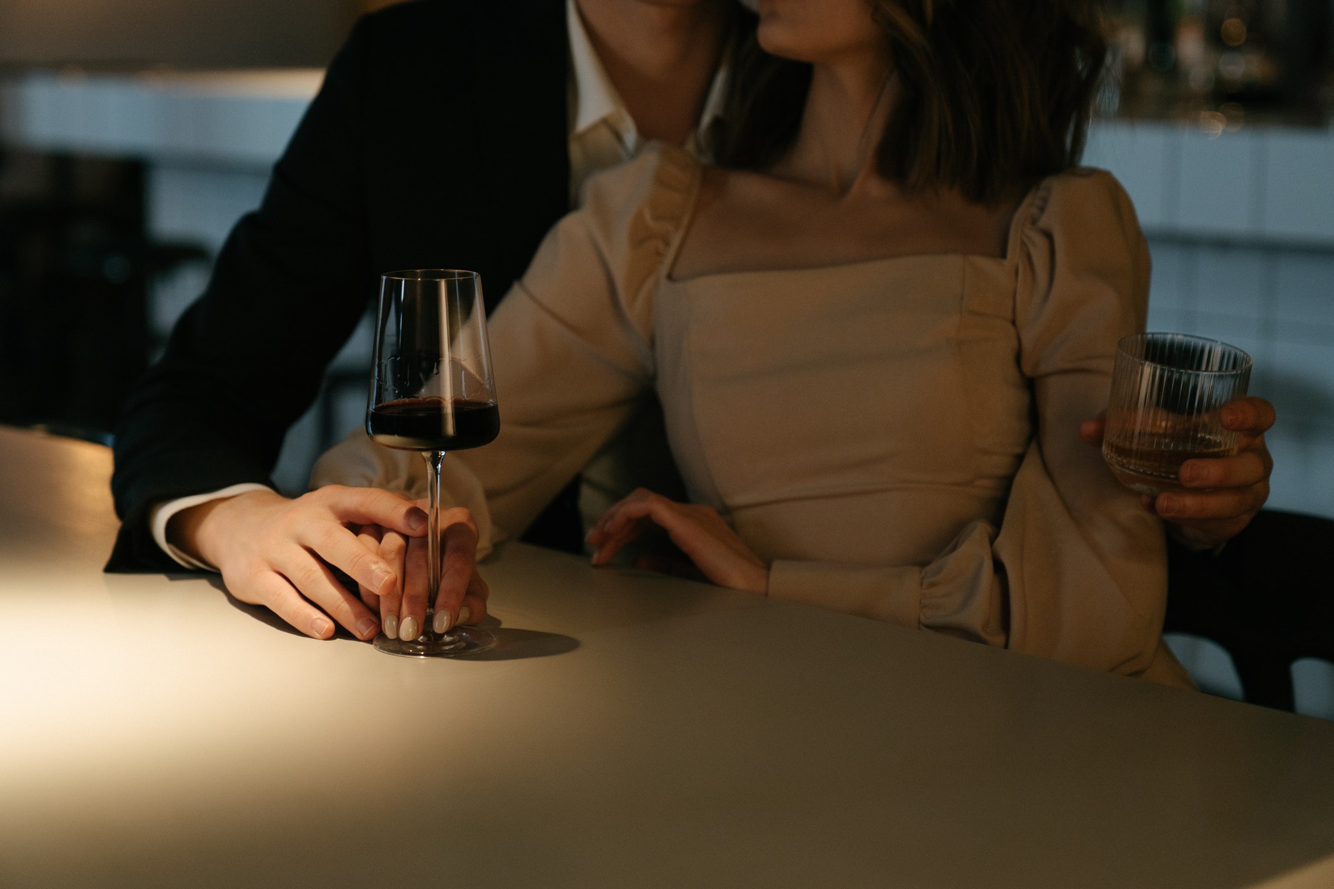 woman holding wine glass