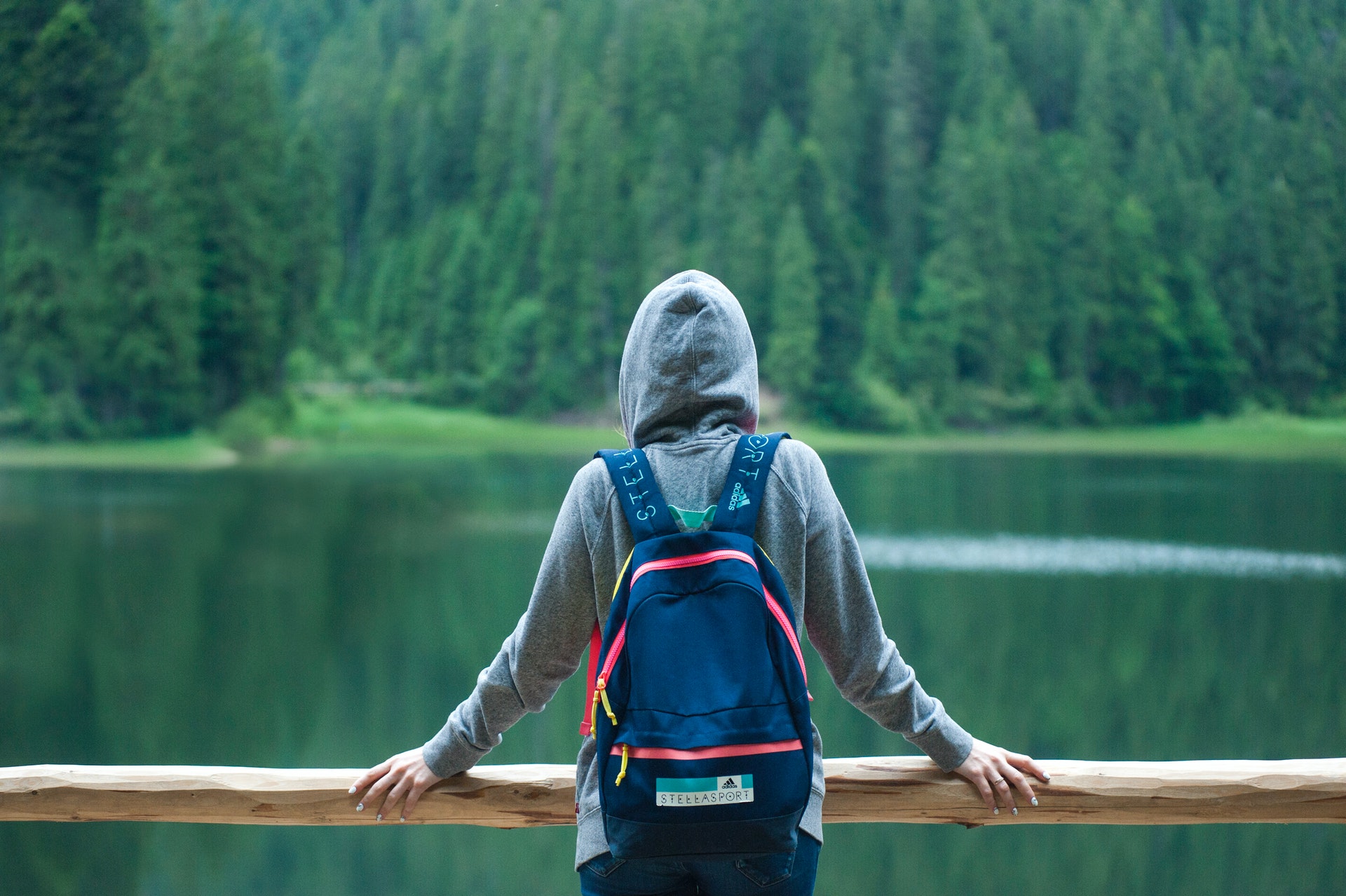 person watching lake