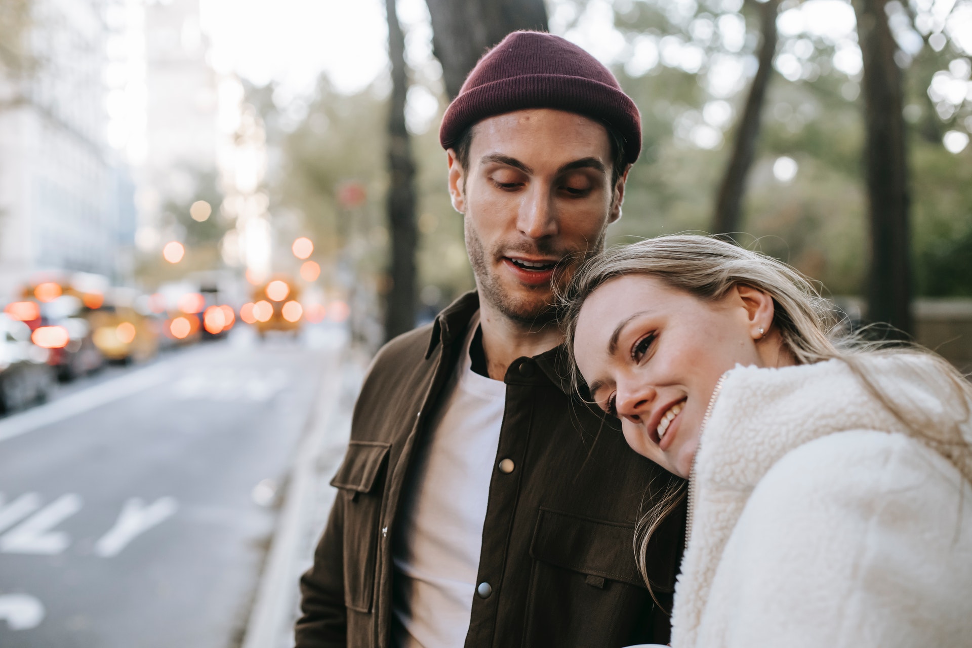 smiling couple on street