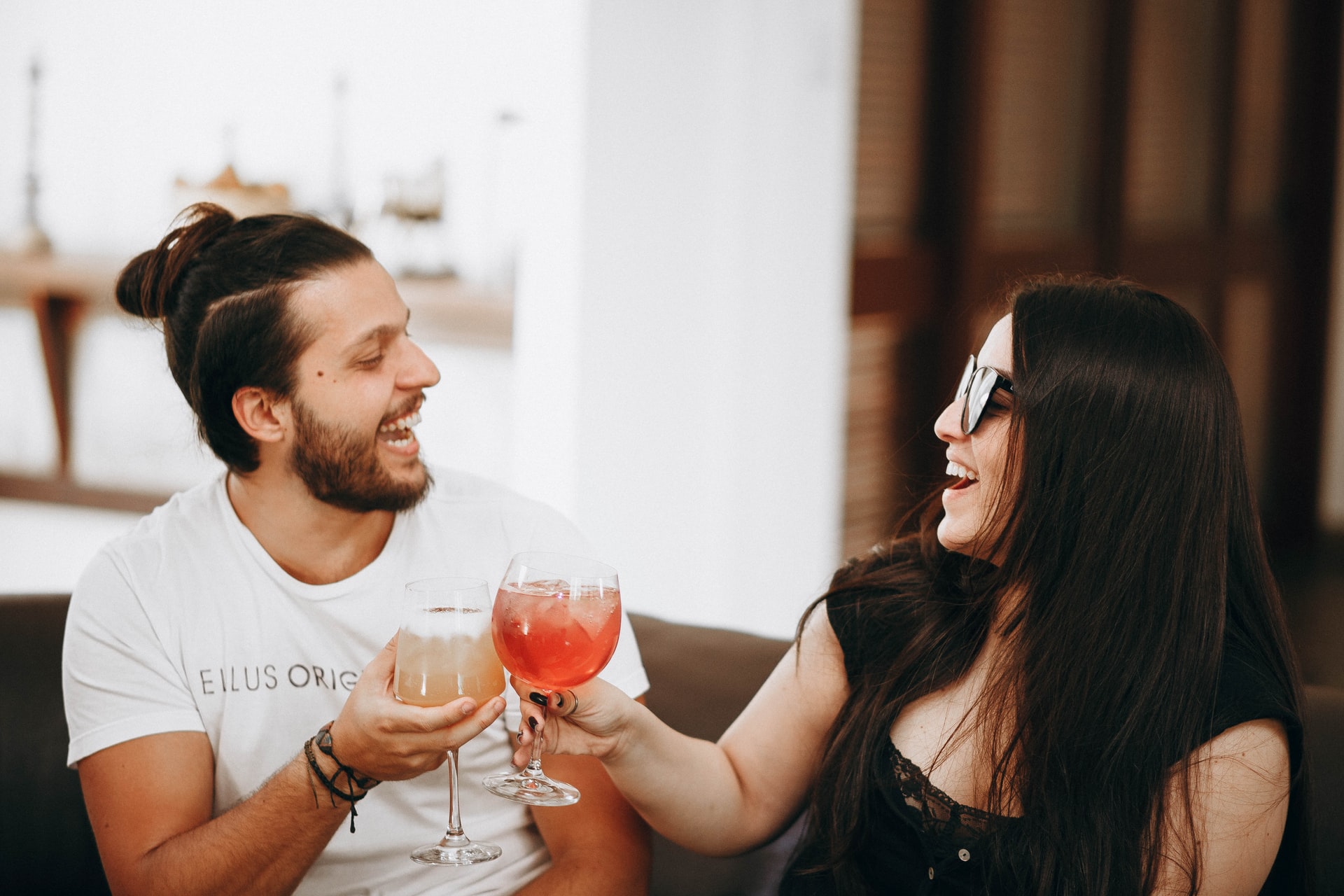 couple holding glass