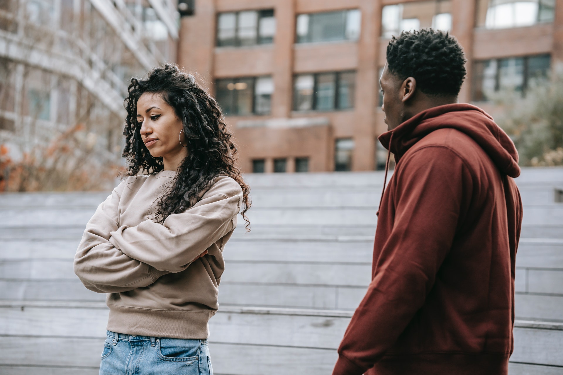 couple arguing in city