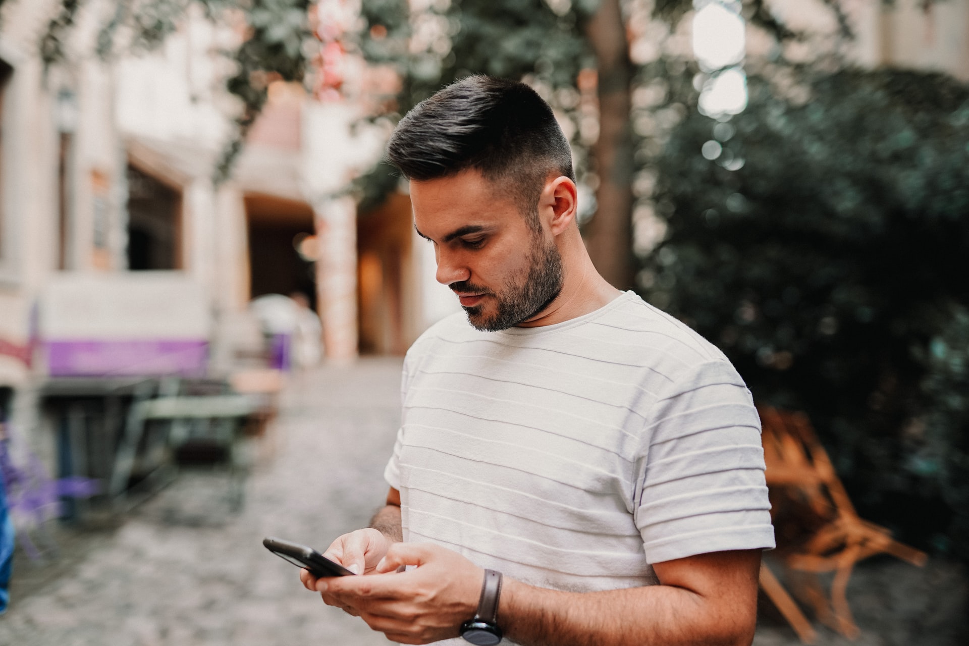 man holding smartphone