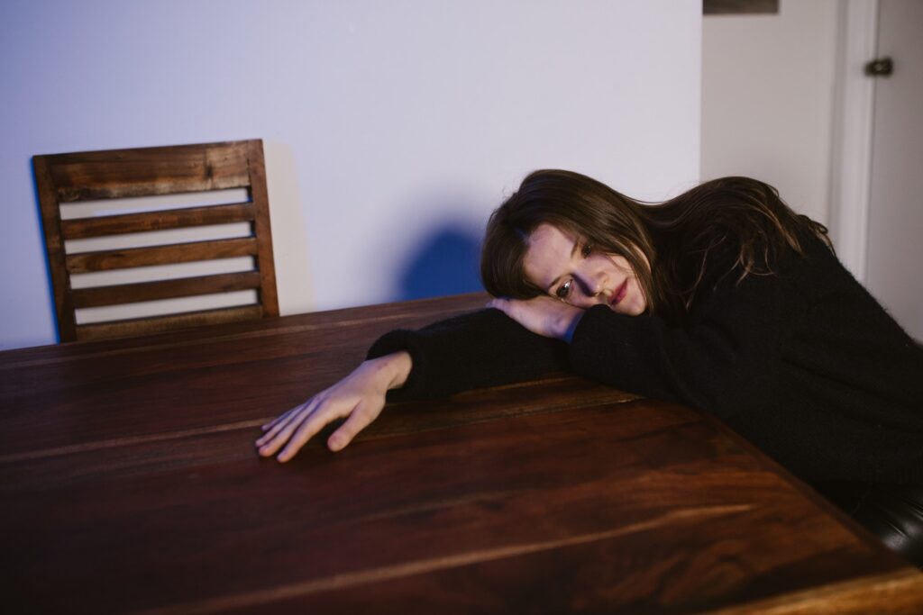 woman lying on the table