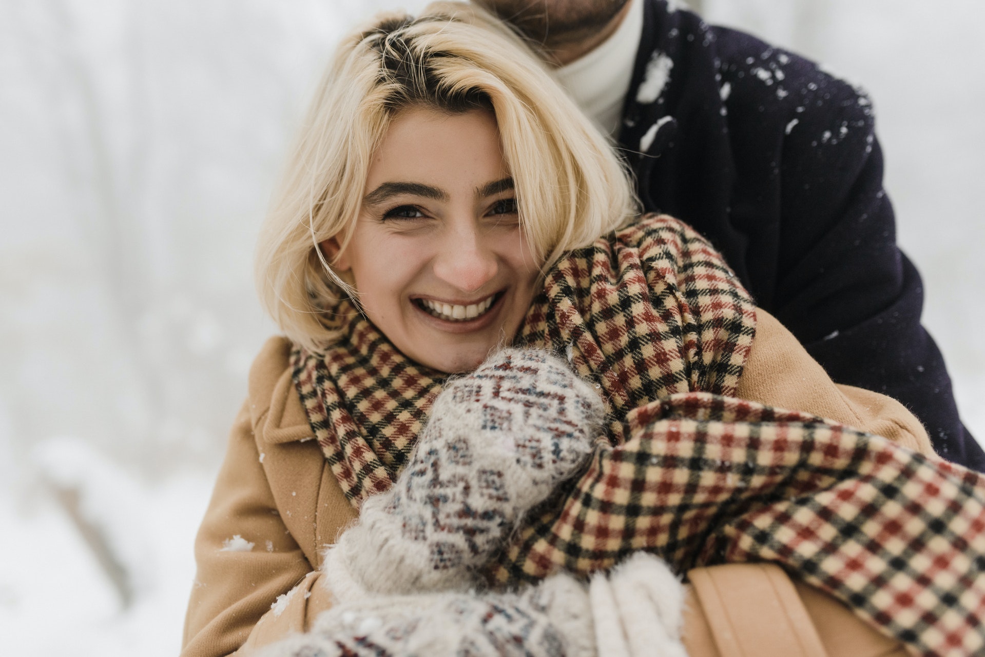 a woman in brown coat