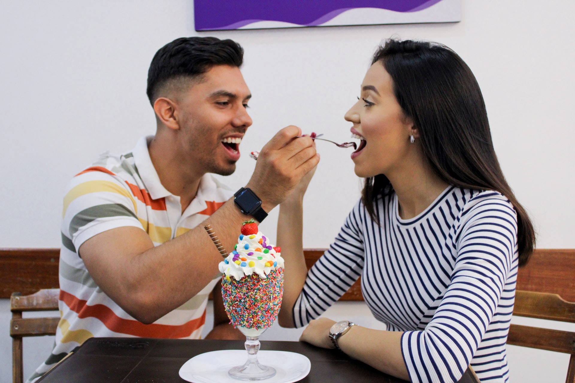 couple about to feed each other