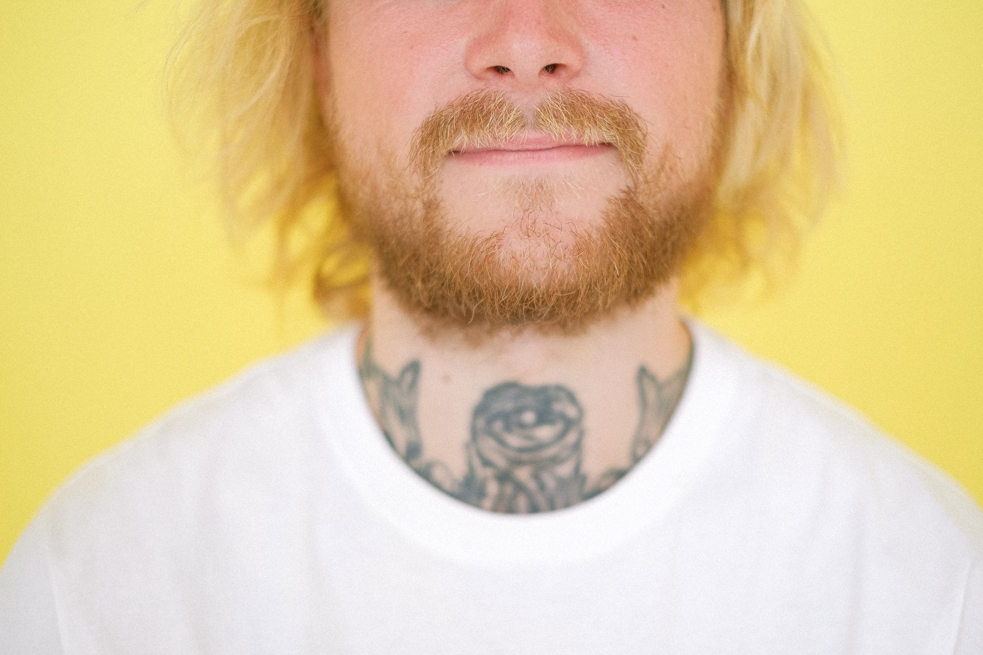 tattooed man with beard