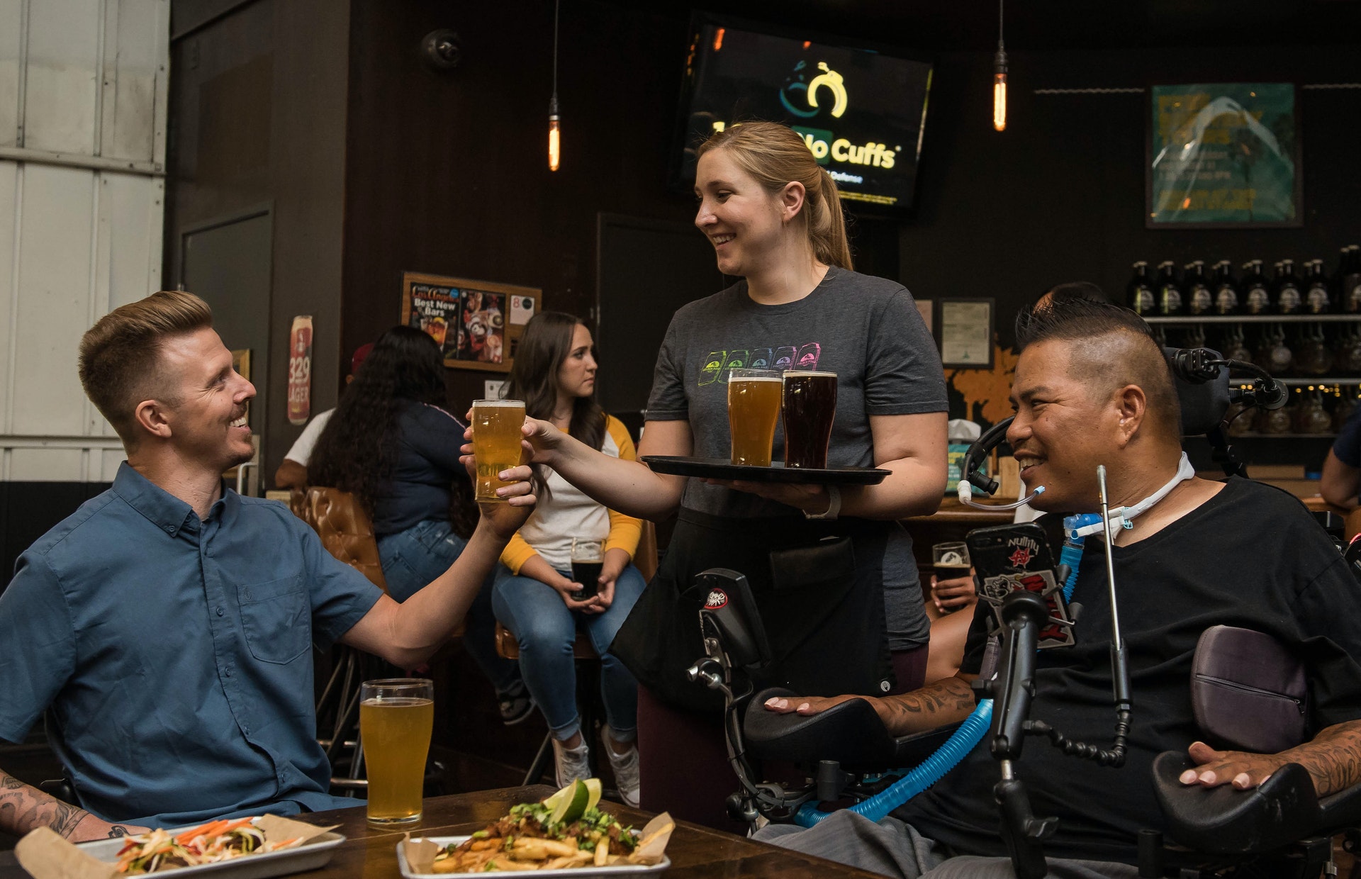 woman serving at a bar