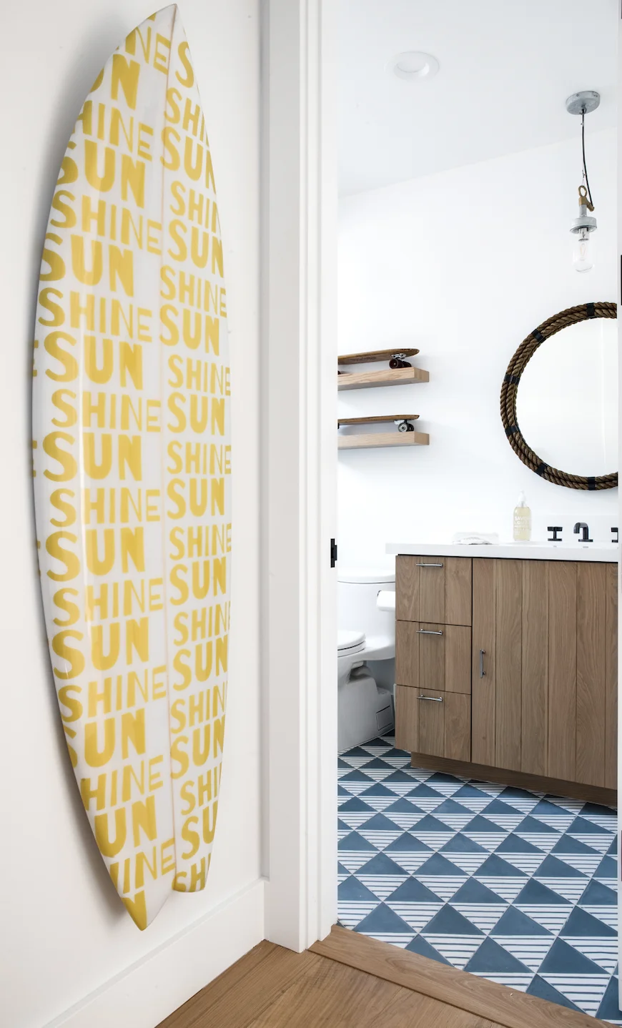 a bathroom with a mirror and a sink