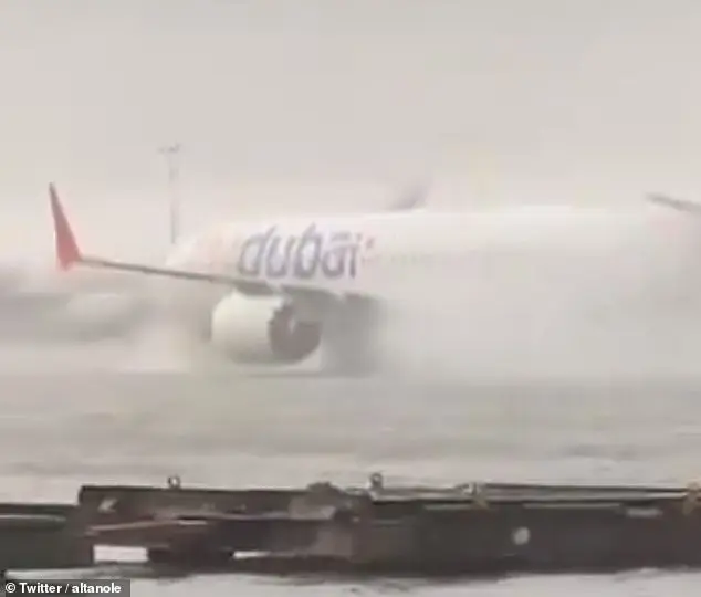 Planes are caught in intense flooding at Dubai International Airport on Tuesday