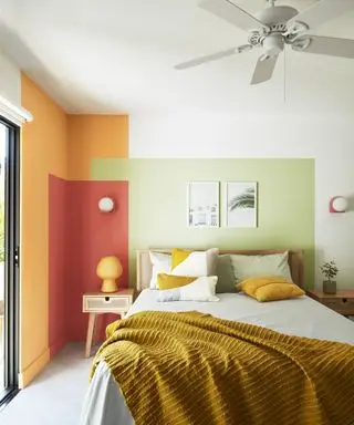 60s style bedroom with a color blocked wall design