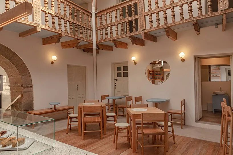 colonial peruvian house turns into women-led café featuring bespoke furniture