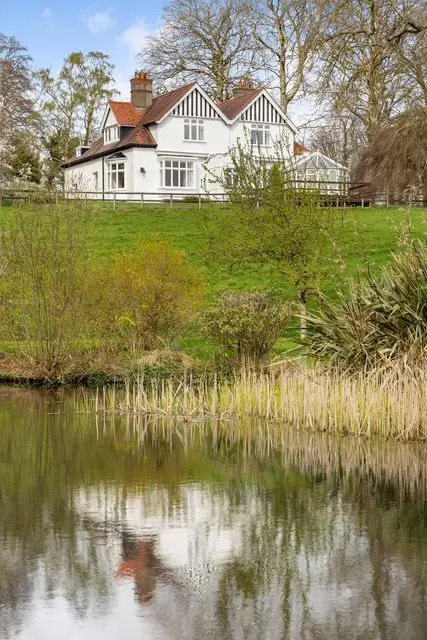 The house is surrounded by a moat