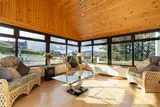 thumbnail: The sunroom with triple-aspect windows