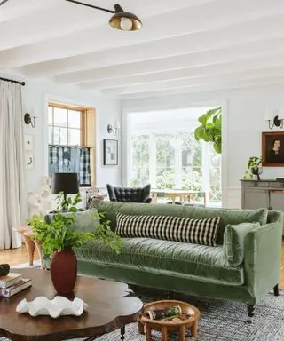 living room with green sofa