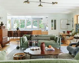 living room with green sofa