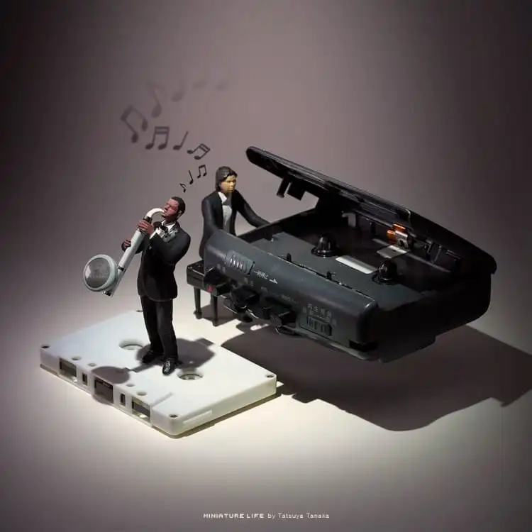 Miniature depicting musicians playing on casettes