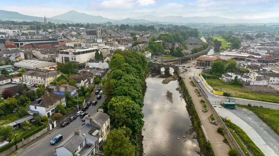 An aerial view of the property (left) and the river