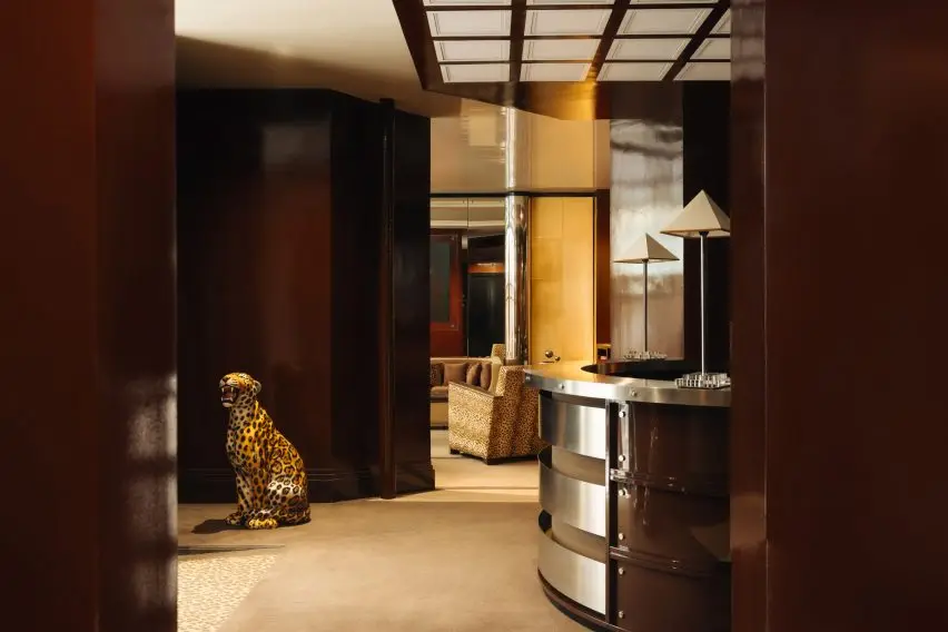 Hotel hallway with view of lounge area