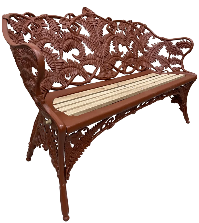 reddish-brown iron with wooden seat