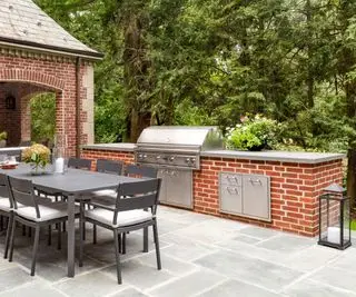 Outdoor kitchen decorated with lanterns