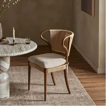 a chair and table in a room a chair and table in a room