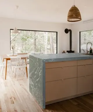 Grey waterfall countertops with storage beneath