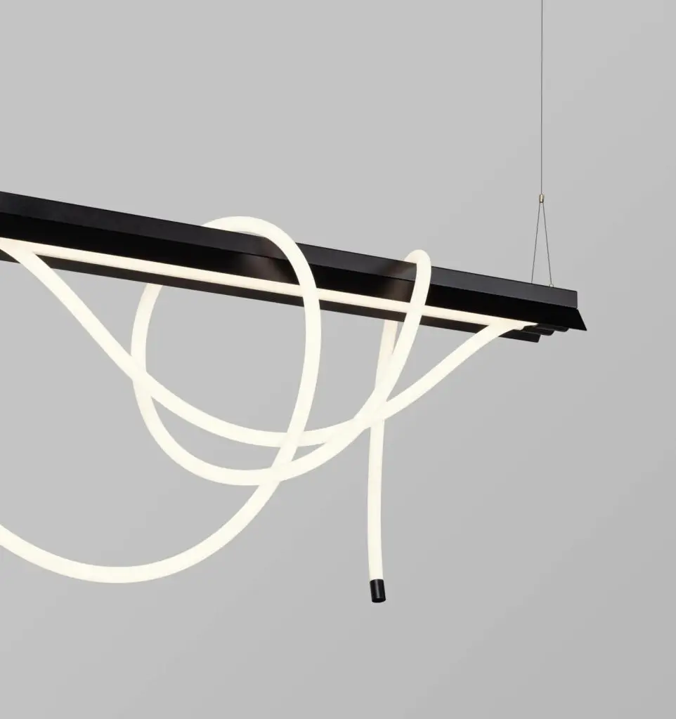 a hanging MOOOI chandelier with an LED tube wrapped around a rectangular black strip